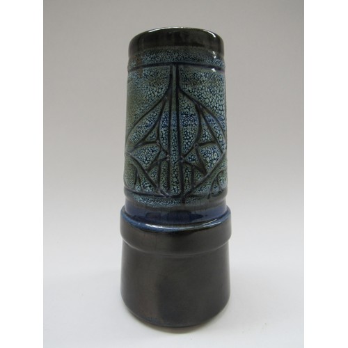 9063 - Celtic Pottery of Newlyn blue glazed tapered cylindrical vae, label to base 15.5cm high