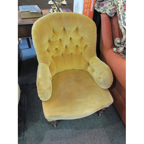 1181 - A Victorian walnut buttoned armchair, velour upholstery, on turned supports to castors     (E) £30-4... 