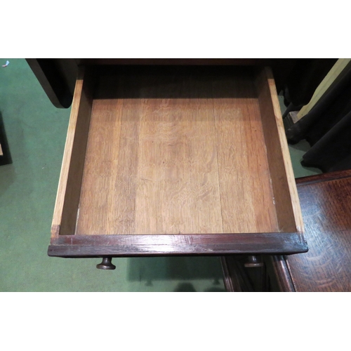 4113 - A Circa 1840 flame mahogany work table, the rising leaves over two end drawers and wool drawer in a ... 