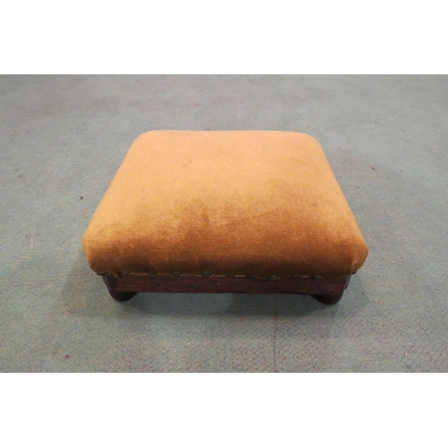 4228 - A 19th Century mahogany canted corner footstool with brass stud decoration on turned feet, 9.5cm x 2... 