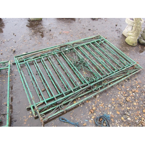 3428 - A pair of iron scrollwork gates