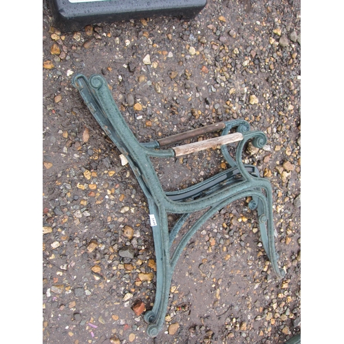 3449 - A pair of cast bench ends