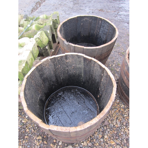 3524 - A pair of half barrel planters