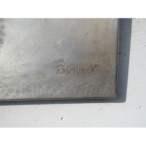 9481 - ROY RASMUSSEN (1919-2014) 'Alone' - an aluminium panel, beaten and embossed depicting a figure of a ... 