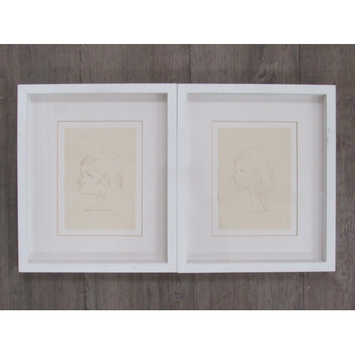 9469 - A pair of mid to late 20th century pen and ink portrait sketches. Unsigned. Framed and glazed. Image... 