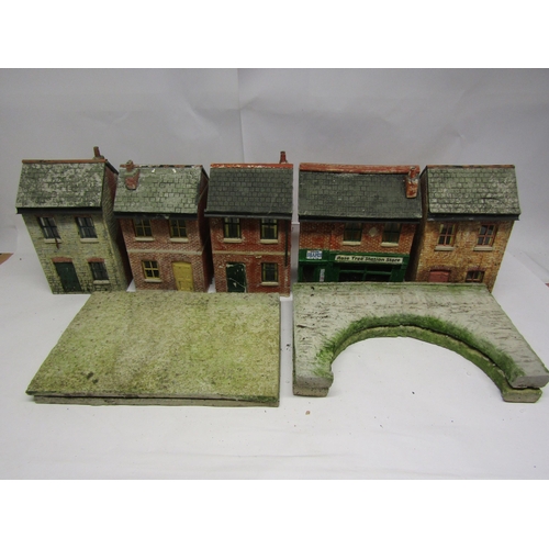 8483 - Four weathered garden railway plastic model lineside buildings, each approx 32cm tall, together with... 