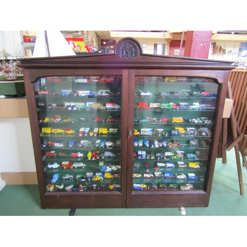 8143 - An Edwardian mahogany glazed display case with glass shelved interior, housing a collection of appro... 