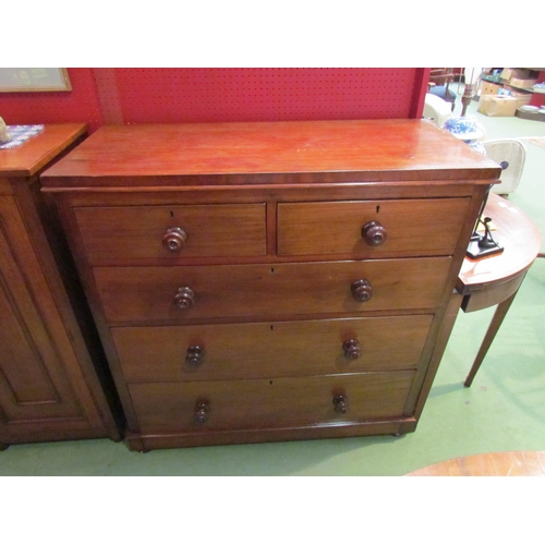 4064 - A late Victorian mahogany chest of two short over three graduating long drawers with turned handles ... 