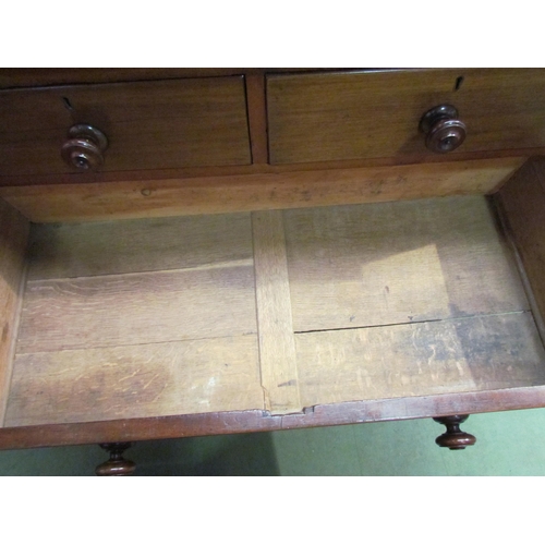 4064 - A late Victorian mahogany chest of two short over three graduating long drawers with turned handles ... 