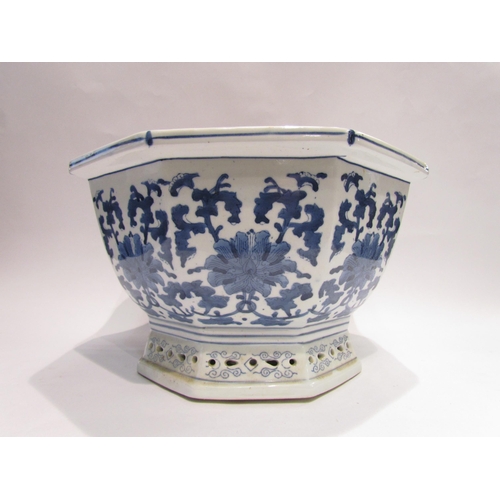 4078 - A Chinese octagonal blue and white planter, 21cm tall x 33cm wide