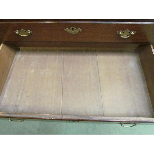 4106 - A George II oak caddy top chest of four graduating long drawers on bracket feet, stamped RW 53 to si... 