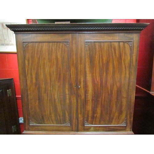 4131 - A Victorian mahogany linen press with oak lined drawers and shelves.  The lower section consists of ... 