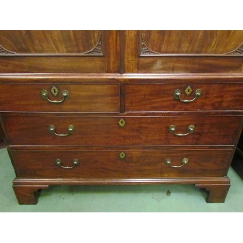 4131 - A Victorian mahogany linen press with oak lined drawers and shelves.  The lower section consists of ... 