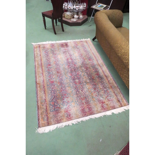 4529 - A teal ground silk rug, foliate stripe, flanked by deep border, 188cm x 140cm   (R) £30