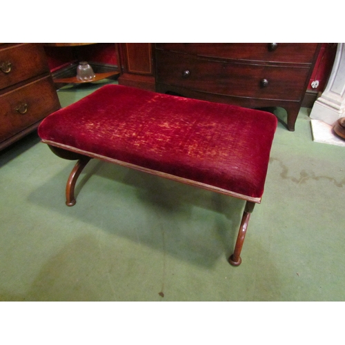 4174 - A mahogany x-frame stool with red velvet upholstery, 45cm tall x 82cm long x 46cm deep