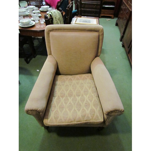 4176 - A late Victorian armchair, the scroll arms and feather filled cushion on ring turned tapering oak fo... 