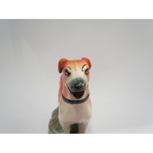 4189 - A Staffordshire Greyhound, 17cm tall