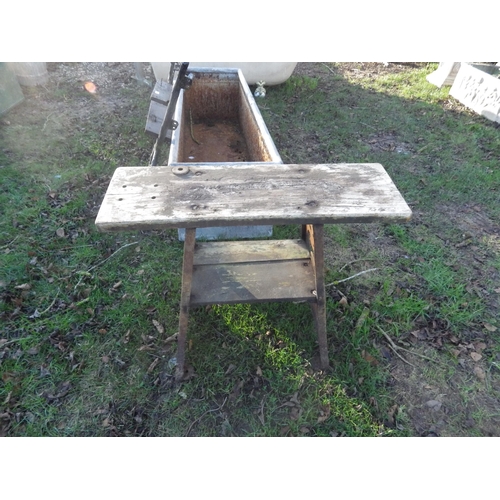 5078 - An industrial Singer table base with wooden top