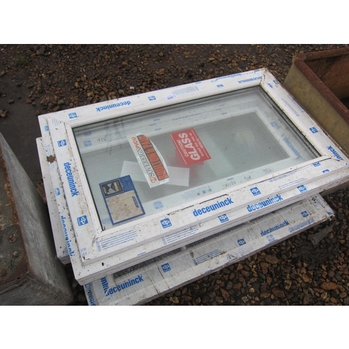 3423 - Four unused glazed UPVC windows