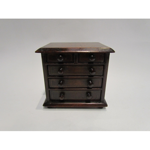 4514 - A Victorian miniature apprentice piece mahogany chest of drawers, 14.5cm tall