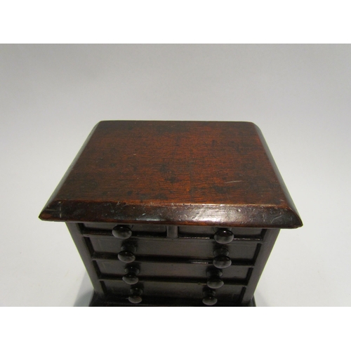 4514 - A Victorian miniature apprentice piece mahogany chest of drawers, 14.5cm tall