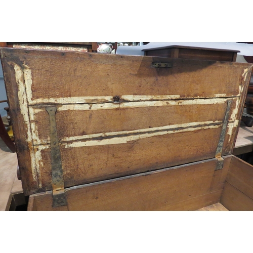 4219 - A George III red oak mule chest with exposed dovetail decoration, the three plank cleated end hinged... 