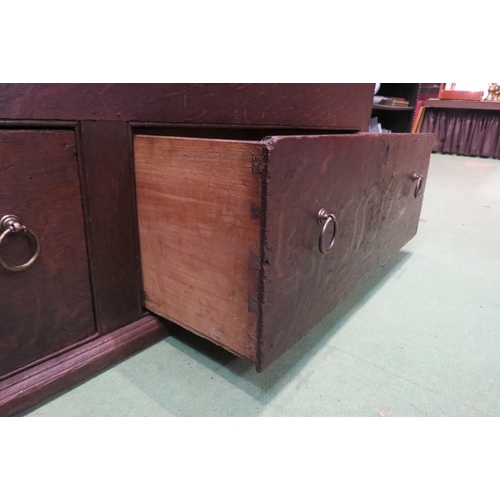 4219 - A George III red oak mule chest with exposed dovetail decoration, the three plank cleated end hinged... 