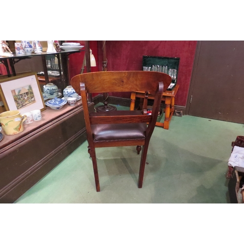 4236 - A Victorian style walnut desk armchair with scroll arms over turned and tapering fore legs   (R) £40