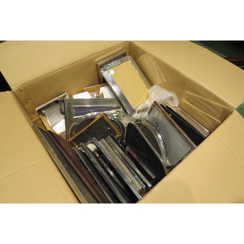 4531 - A box of modern photo frames to include silver plated examples