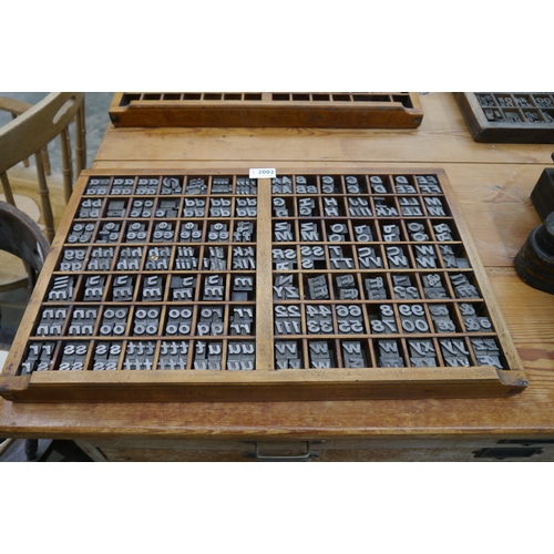 2002 - Three printers trays with metal Alphabet print blocks of varying sizes