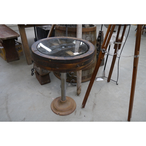 2037 - An Industrial glass top side table on metal base   (R) £65