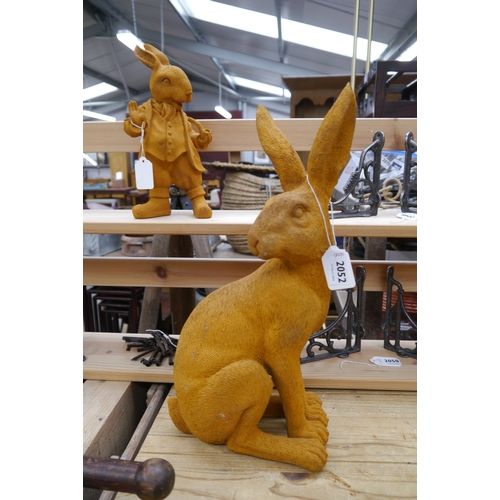 2052 - A large seated hare with rust finish, 44cm tall