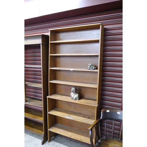 2104 - An oak full height floor standing bookshelf   (R) £30