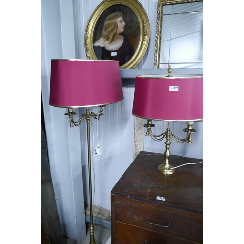 2109 - A brass double sconce standard lamp and matching table lamp   (E) £15-30