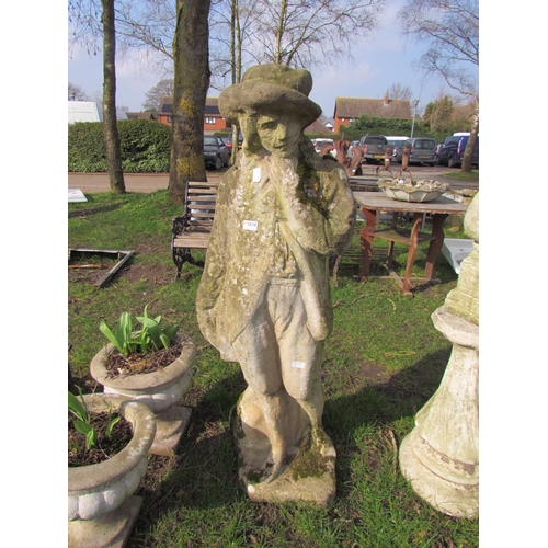 5098 - A weathered stone garden sculpture of gentleman in hat and jacket, 52