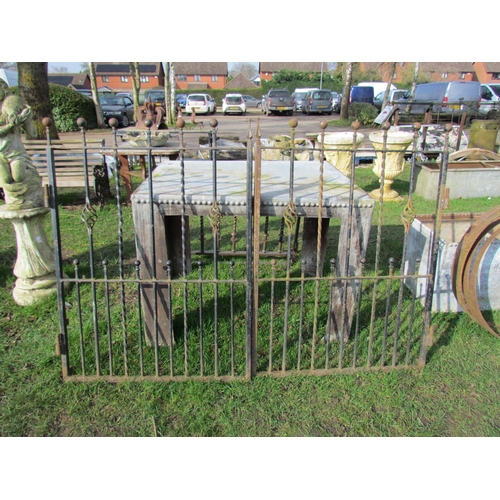 5100 - A pair of decorative drive gates, ball finials, approx 6ft opening