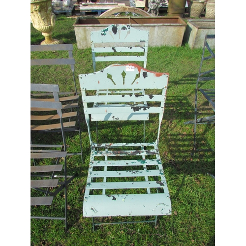 5106 - A pair of metal folding garden chairs