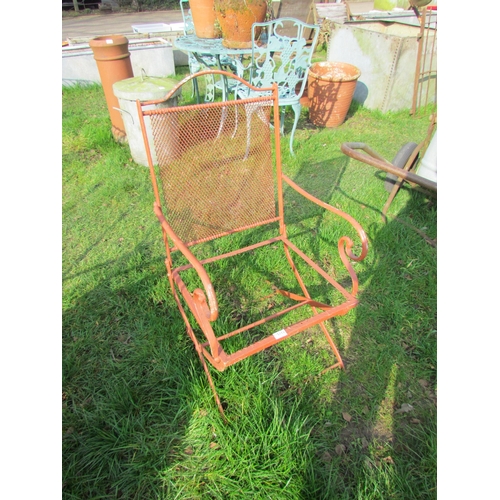 5112 - A wrought iron and mesh garden chair a/f