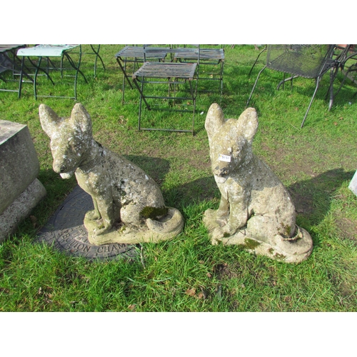 5151 - A pair of composition seated dogs, 25