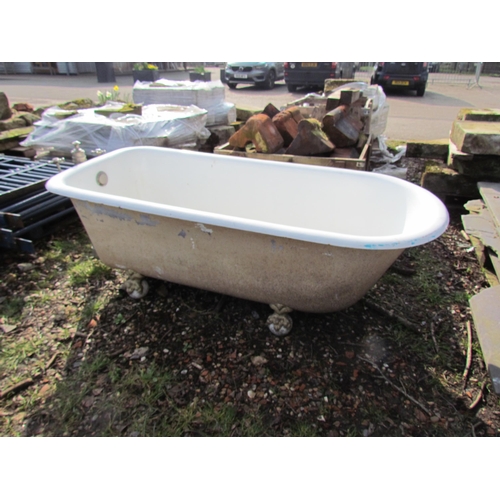 5160 - An early 20th Century French double ended roll top bath on claw feet with waste  (E)  £60-90