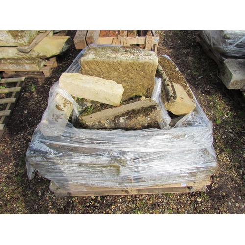 5163 - A pallet of mixed weathered stone elements