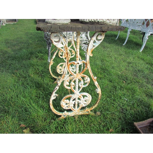 5185 - A metal and wood garden table