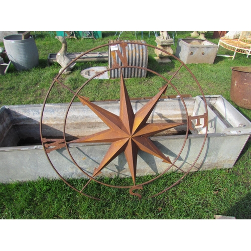 5190 - A steel compass wall plaque, 42