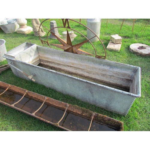 5191 - A riveted galvanised water trough, 73.5