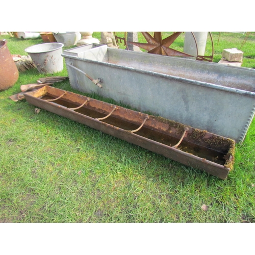 5192 - A 6ft cast iron feed trough with dividers