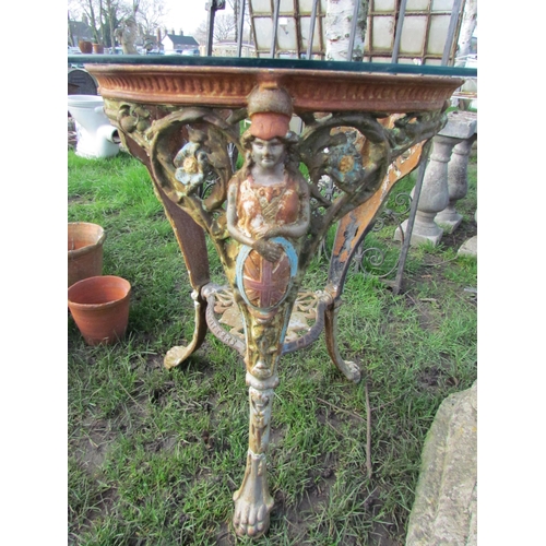 5204 - A cast iron pub table base with round glass top  (R)  £50