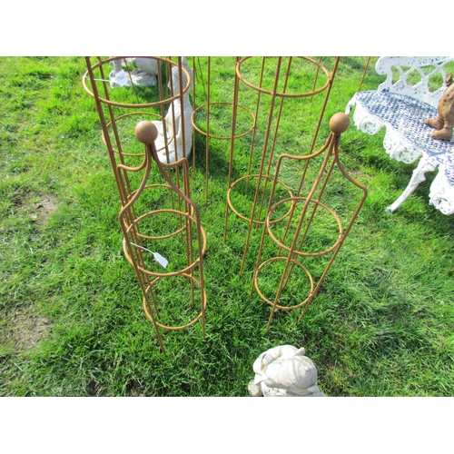 5263 - A pair of steel obelisks