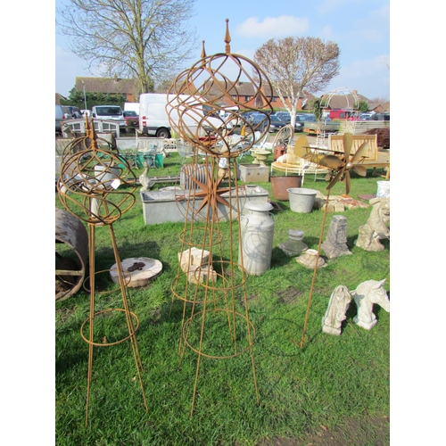 5270 - A pair of steel orb top obelisks