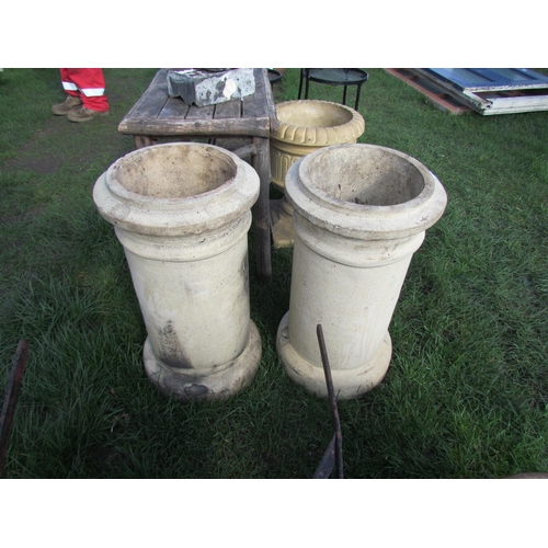 5296 - A pair of buff cannon top chimney pots