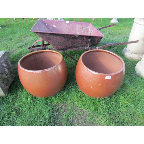 5298 - A pair of bulbous glazed planters, 14